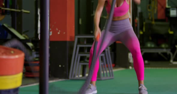 Woman exercising in a gym