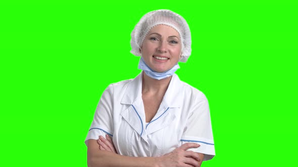 Pretty Mature Doctor on Green Screen.