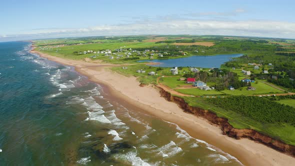 Thunder Cove Beach, summertime. Beautiful aerial view showing the distant Prince Edward Island lands