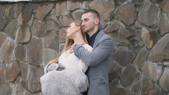 Couple Walking Down the Street