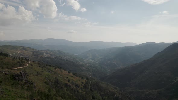 Mountainous landscape and deep valleys in Peneda-Geres National Park in Portugal. Aerial forward