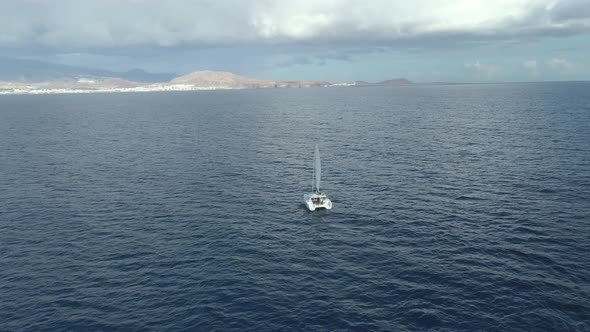 Aerial View of Catamaran Yacht in Ocean