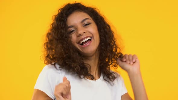 Extremely Happy Mixed-Race Girl Dancing, Celebrating Lucky Day, Inner Freedom