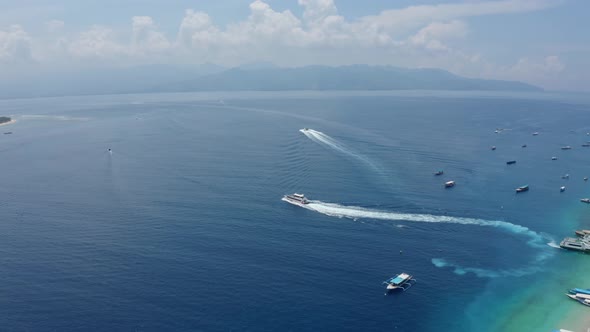 Fast Motorboat Sails From Beautiful Sand Beach Aerial View