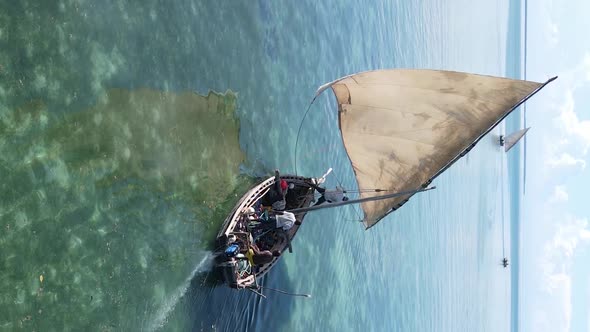 Tanzania Vertical Video  Boat Boats in the Ocean Near the Coast of Zanzibar Aerial View