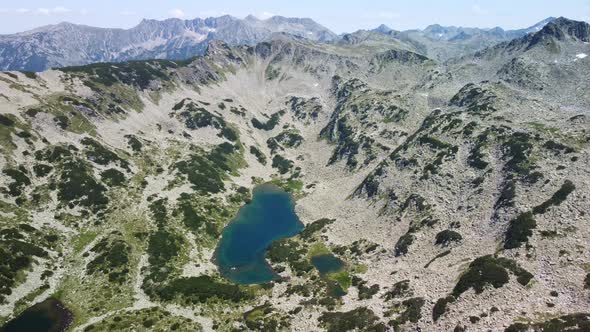 Aerial View of a Lake in the Pirin Mountains with Blue Clear Water