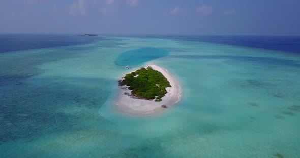 Tropical flying abstract shot of a summer white paradise sand beach and blue ocean background in hi 