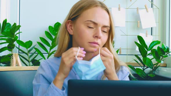 Young Woman Working on a Computer at Home