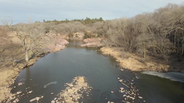 Fly over river at Palisades State Park in Eastern South Dakota