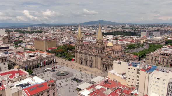 Aerial View Of Guadalajara Cathedral And Plaza Guadalajara In Jalisco, Mexico. - orbit left