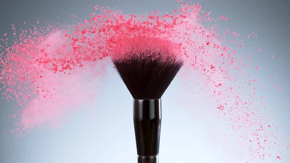 Super Slow Motion Shot of Makeup Brush and Pink Powder Shake at 1000 Fps