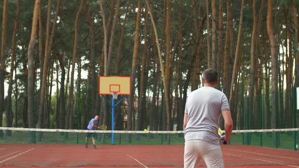 Male Tennis Player Scoring a Point During Game