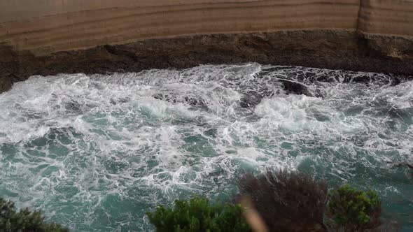 Peaceful calming Footage of beautiful blue ocean waves crashing the rocky shore at Loch Ard Gorge 12