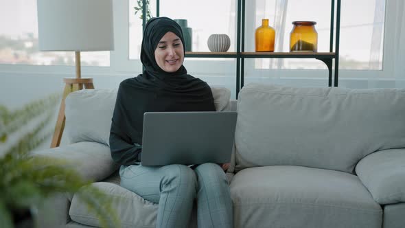 Indian Muslim Businesswoman Wear Black Hijab Speak Look at Laptop Camera Islamic Arabic Lady Talk to
