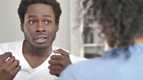 African Man Talking with Girlfriend