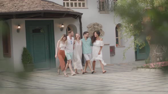 Group of happy young people having fun outdoors