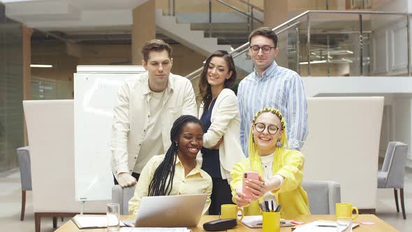 Good Looking Business People Having Photo Session at Workplace