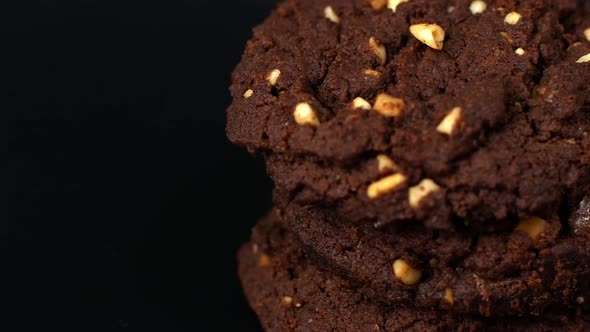 Slider close-up filming of chocolate chip cookies. Food biscuits close-up motion.