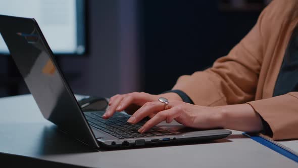 Closeup of Businesswoman Hands on Keyboard Sitting at Desk in Startup Company Office