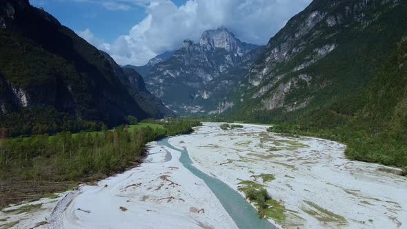 Aerial View of Valley with Italian Dolomites All Around