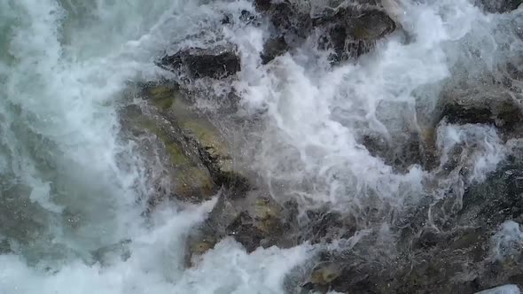 Flowing Water in Mountain River Close Up