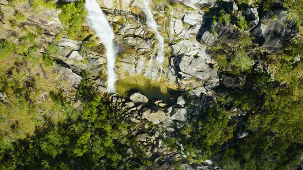 Aerial, A Waterfall In The Middle Of Rain Forest At Davies Creek In Queensland, North Australia