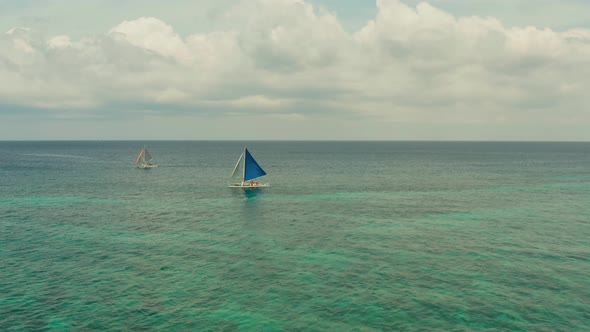 Sailing Yacht in Blue Sea