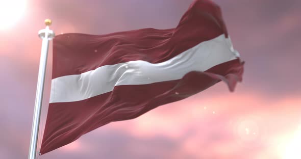 Flag of Latvia at Sunset