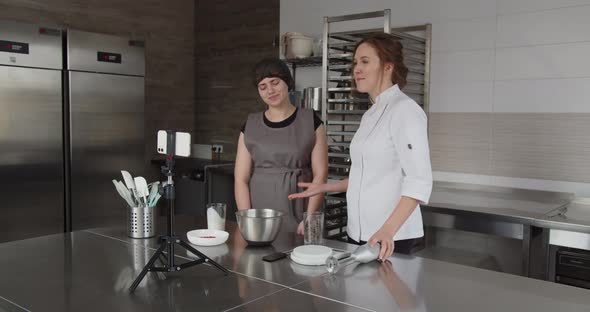 A Professional Chef and His Assistant Tell and Demonstrate a Recipe
