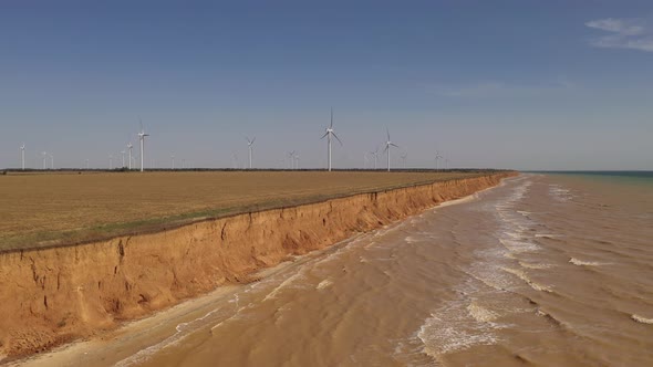 Aerial View of the Wind Turbines Near the Sea