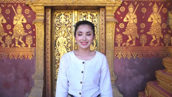 Pretty Asian Woman Walking In Temple