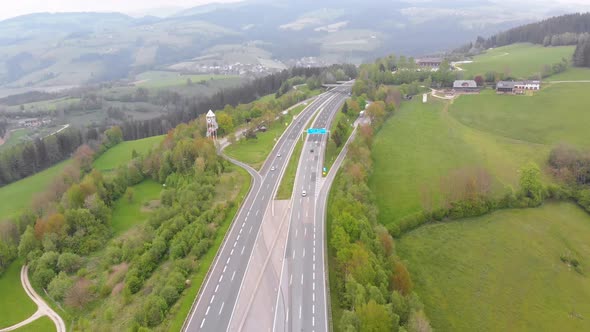 Aerial View of the Highway Viaduct on Concrete Pillars in the Mountains