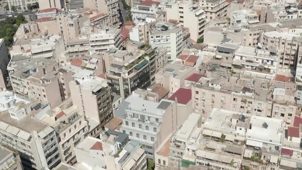 Aerial Overhead Top Down View of Athen, Greece City Apartment Building and Streets in Summer