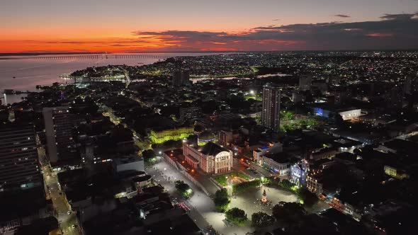 Sunset sky over downtown Manaus Brazil. Cityscape tourism landmark.