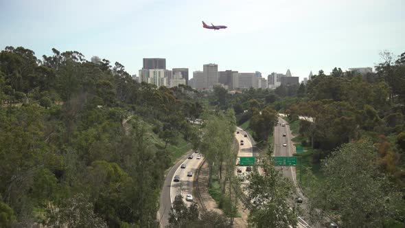 Plane flying above the Cabrillo Freeway