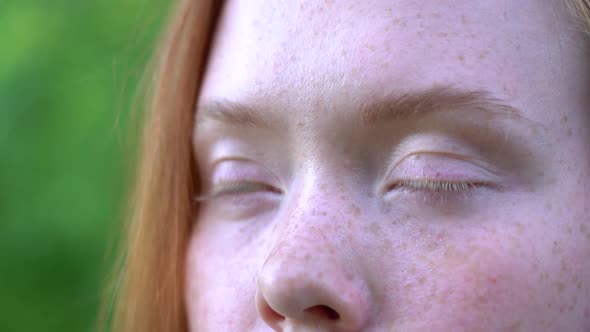Beautiful Eyes of a Redhead Girl Close Up