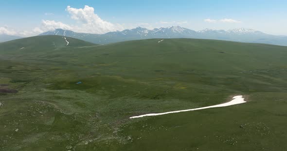 Slope Mountains And Green Fields At Ktsia-Tabatskuri Managed Reserve In Samtskhe-Javakheti Region of