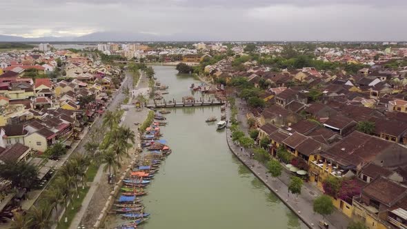 Hoi An River Urban Landscape Channel with Bridge and Boats