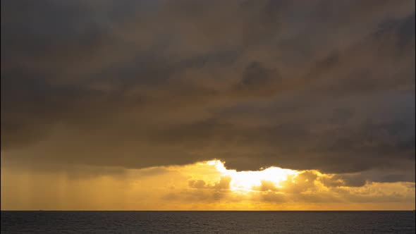 Cloudy In Golden Sunset In The Sea.