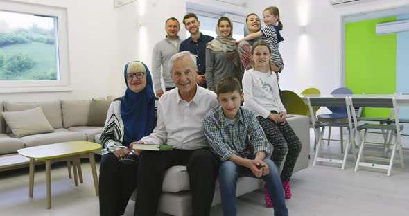 Several Generations Portrait of Happy Modern Muslim Family Before Iftar Dinner During Ramadan Feast