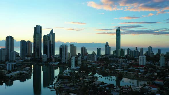 Slowly flying high over Surfers Paradise at sunrise featuring the Q-one  building