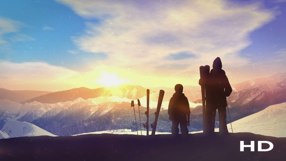 Family Skiers On Top Of The Mountain HD