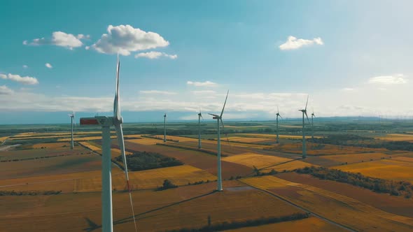 Aerial View of Wind Turbines Farm and Agricultural Fields. Austria.