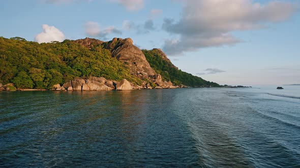 Aerial Footage of Famous Tropical Beach Anse Source d'Argent at Sunset Evening Soft Light