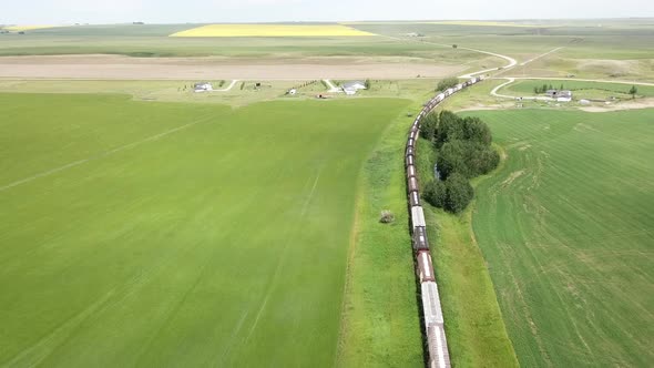 Aerial Footage High Over Length Of Idle Train Cars