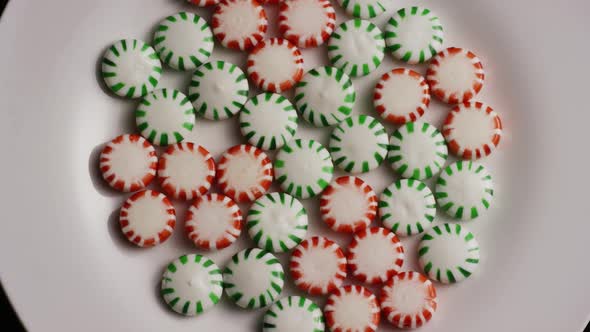 Rotating shot of spearmint hard candies - CANDY SPEARMINT 058