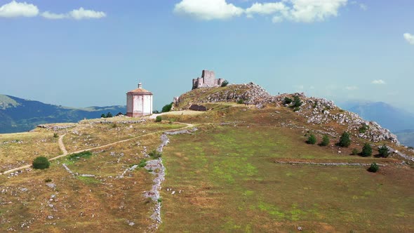 Aerial View of Ancient Castle on Mountain Hill Pine Forest on Mountain Slope