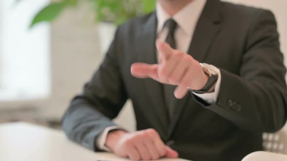 Close Up of Hand Gesture of Middle Aged Man Pointing at the Camera
