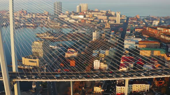 Drone View of the Impressive Cablestayed Golden Bridge at Sunrise