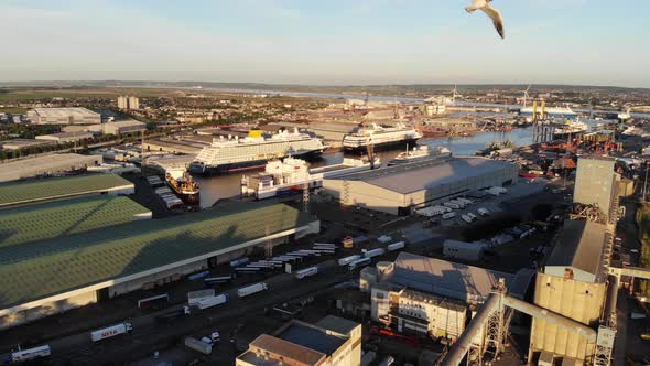 Aerial view of two cruise ships moored in Tilbury docks at sunset